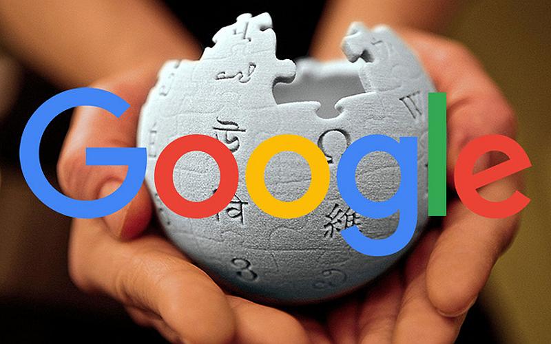 Vemos una esfera blanca con fichas de rompecabezas que tienen letras en   diferentes idiomas y encima en colores fuertes la palabra Google l
