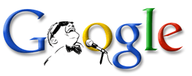 La palabra google y en la primera O un hombre mayor con gafa y un microfono riendose