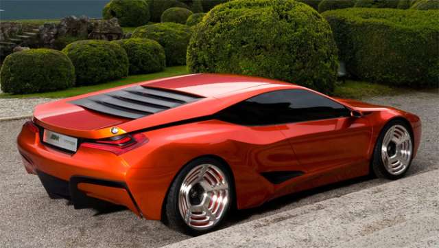 Vemos un auto color naranja de diseño aerodinamico de gran lujo