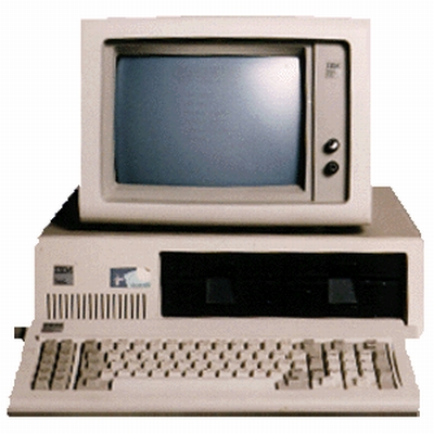 Vemos un antiguo computador con  su teclado y todas sus partes
