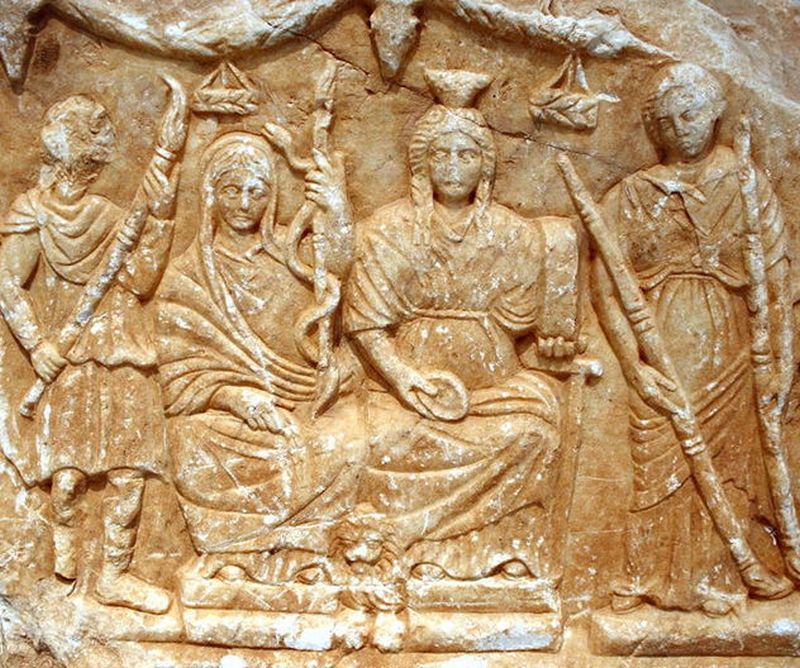 Grabado en una parede de personas